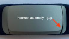 There is an arrow pointing to the small gap in bottom right corner where the Muse S Pod meets to Muse S fabric band.